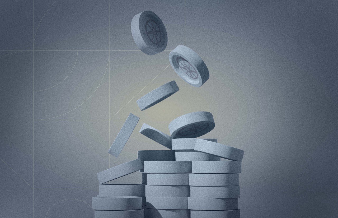 Abstract illustration of stacked coin-like discs, with several discs floating and falling above the stack against a muted gray background.